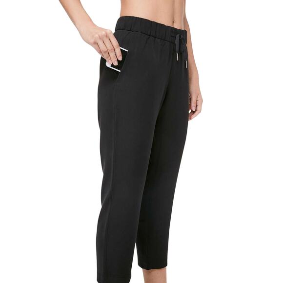 Lululemon On The Fly Crop Woven 23" Black Women's Size 4 Good Used Condition - Picture 3 of 9